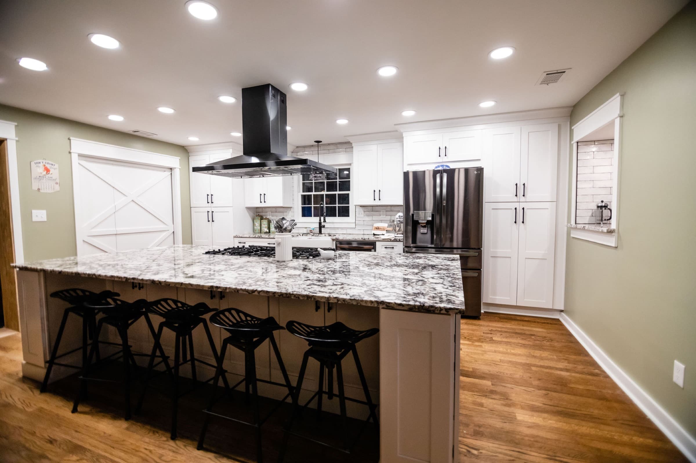 Acworth kitchen remodel — wide view with barn door pantry