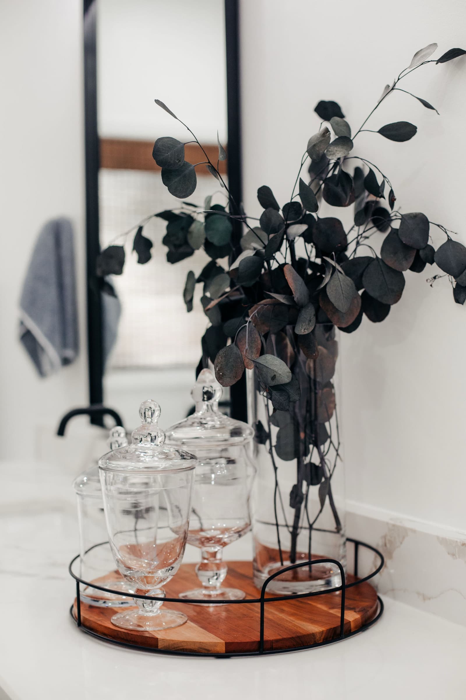 Addison Ct bathroom remodel — styled vanity tray detail
