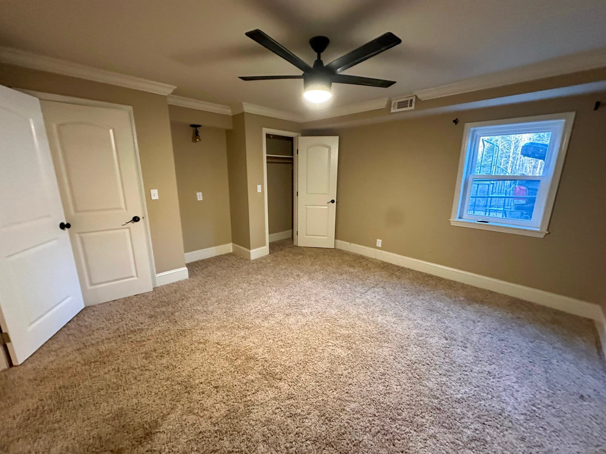 Ball Ground basement before renovation — unfinished space