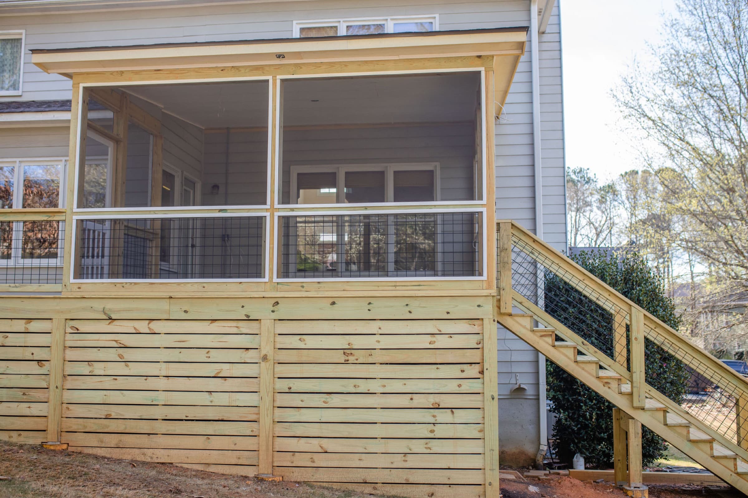 Bridgemill home before renovation — deck framing in progress