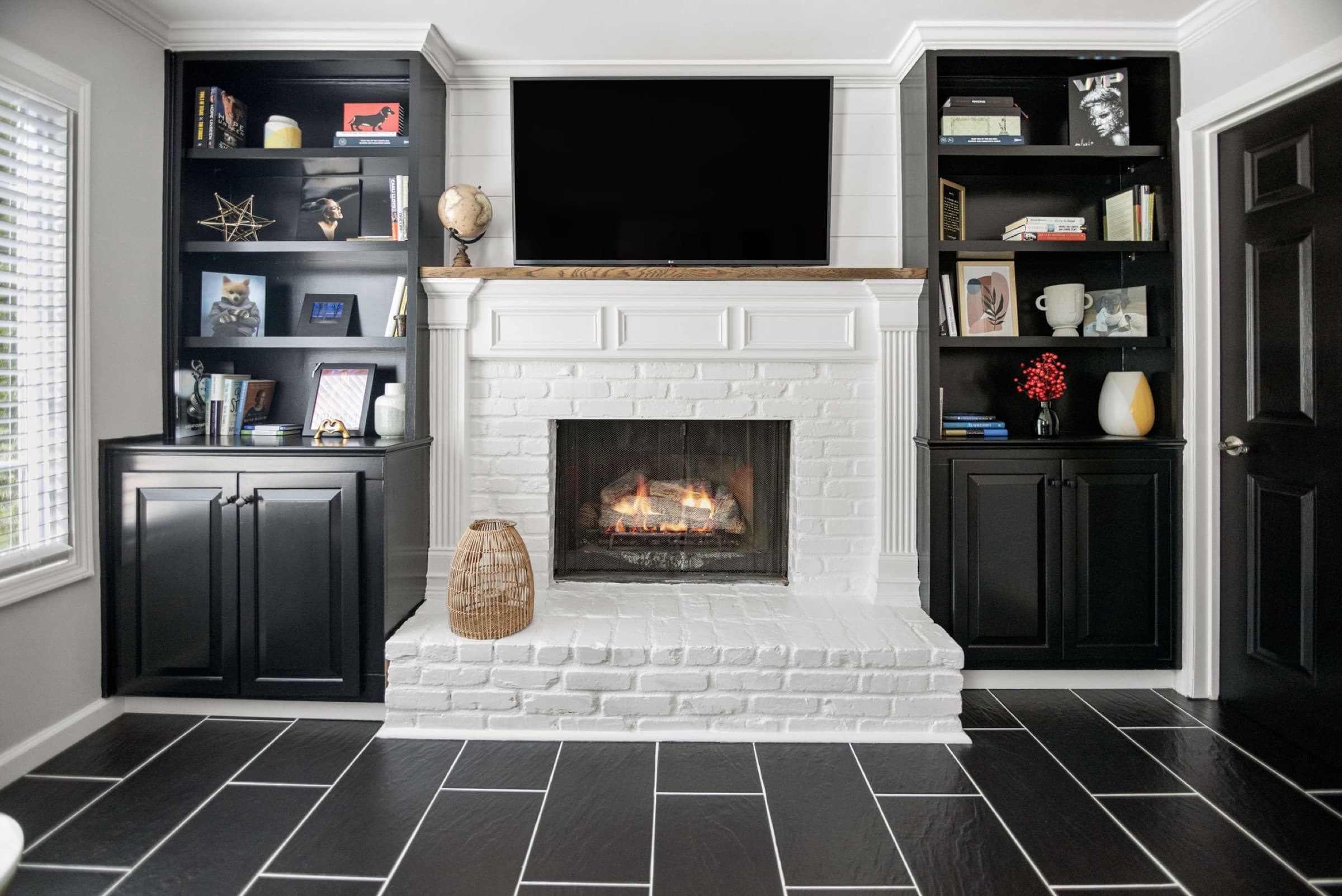 Candlestick Ct renovation — painted brick fireplace with wood mantel detail