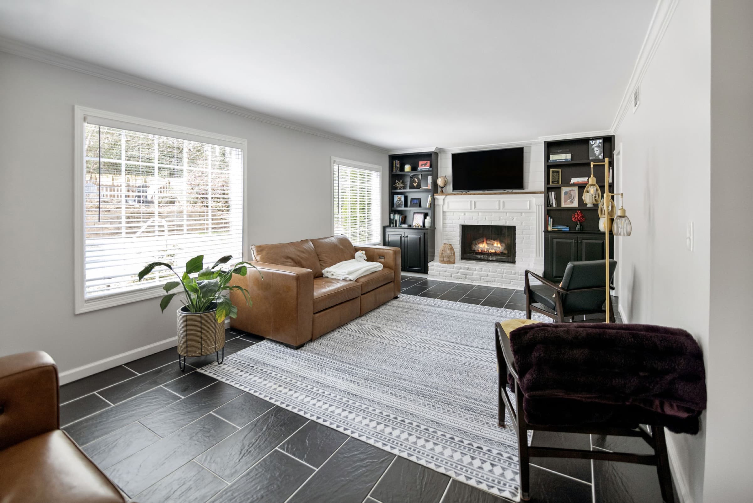 Candlestick Ct renovation — living room seating area with fireplace in view