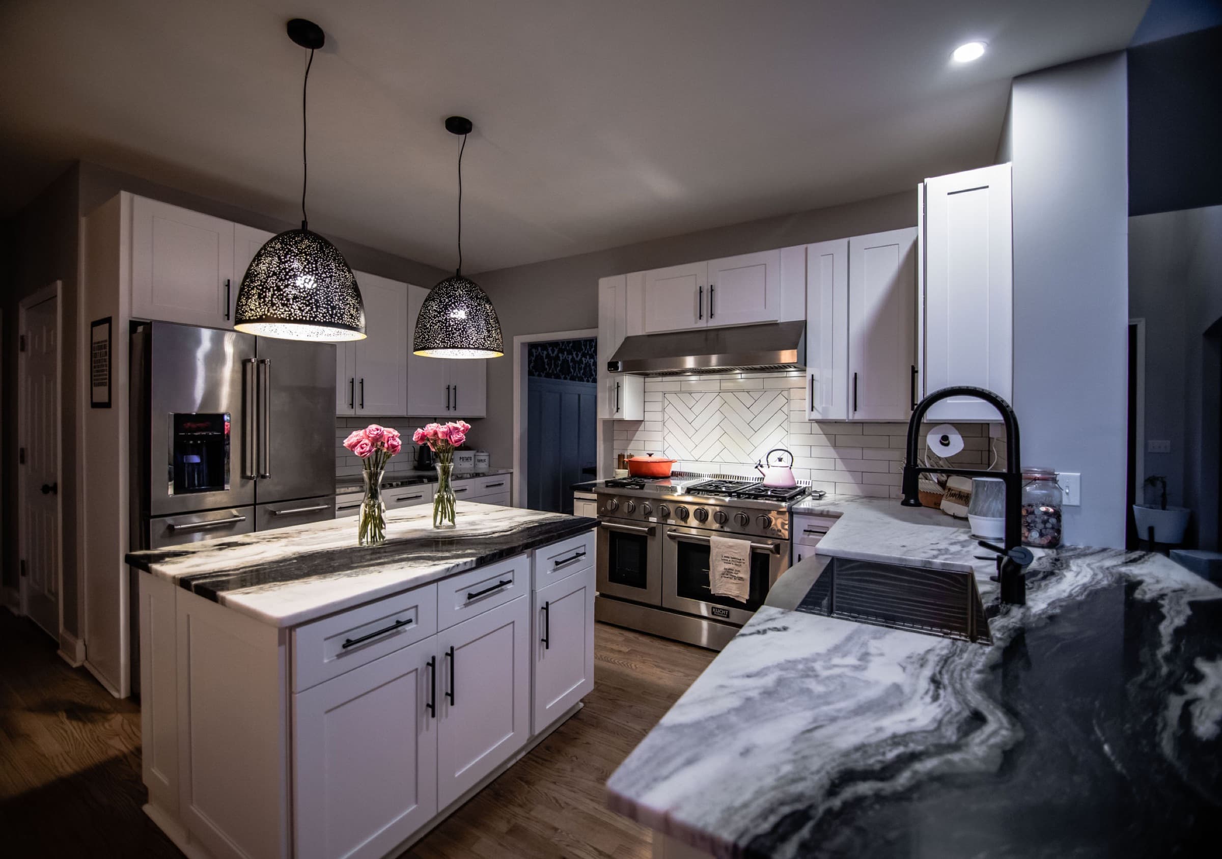 Canton kitchen remodel — island, range, and pendant lighting