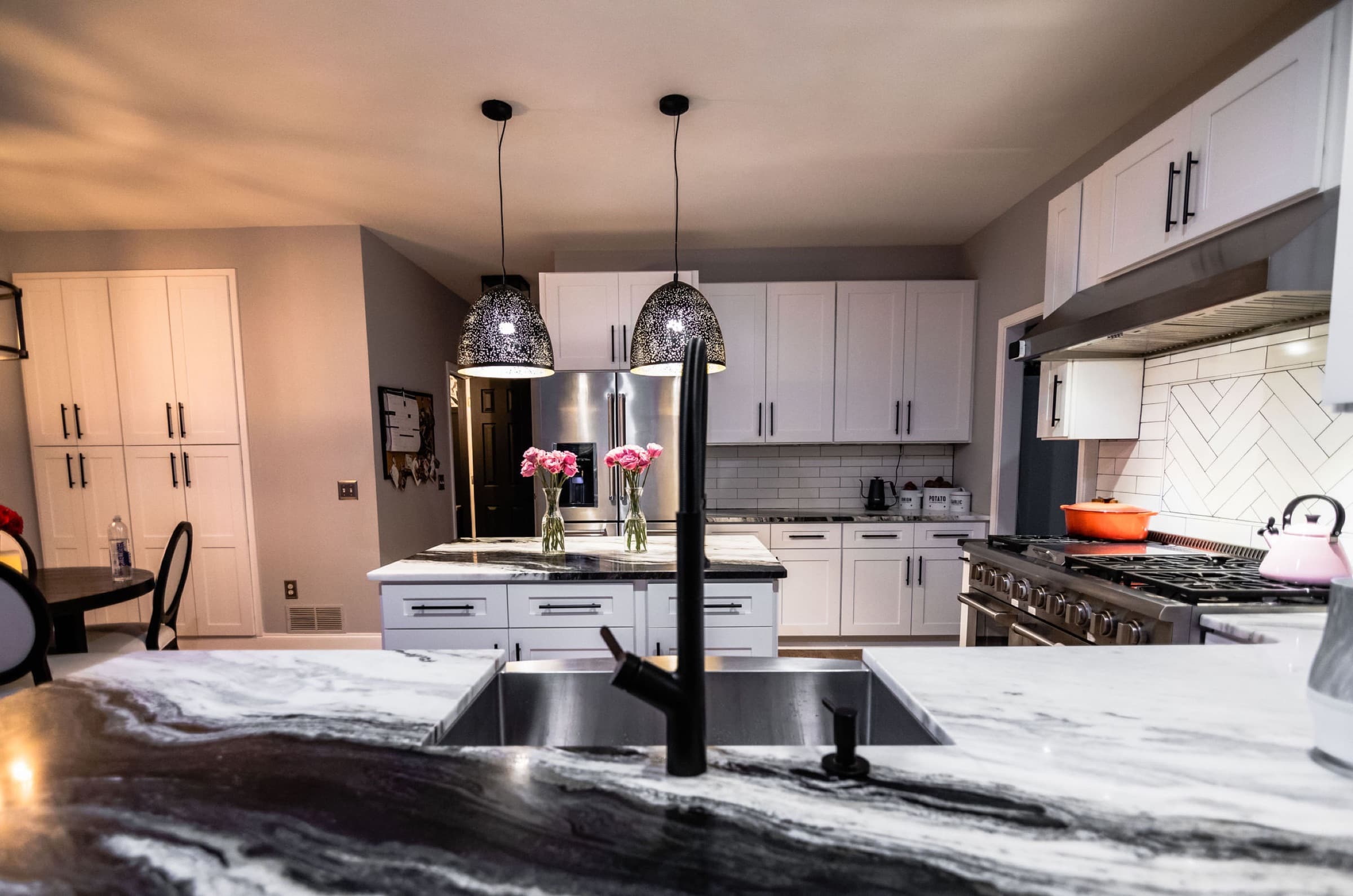 Canton kitchen remodel — black faucet and marble island detail