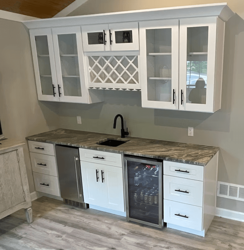 Custom wet bar — wine lattice storage and glass-front upper cabinets