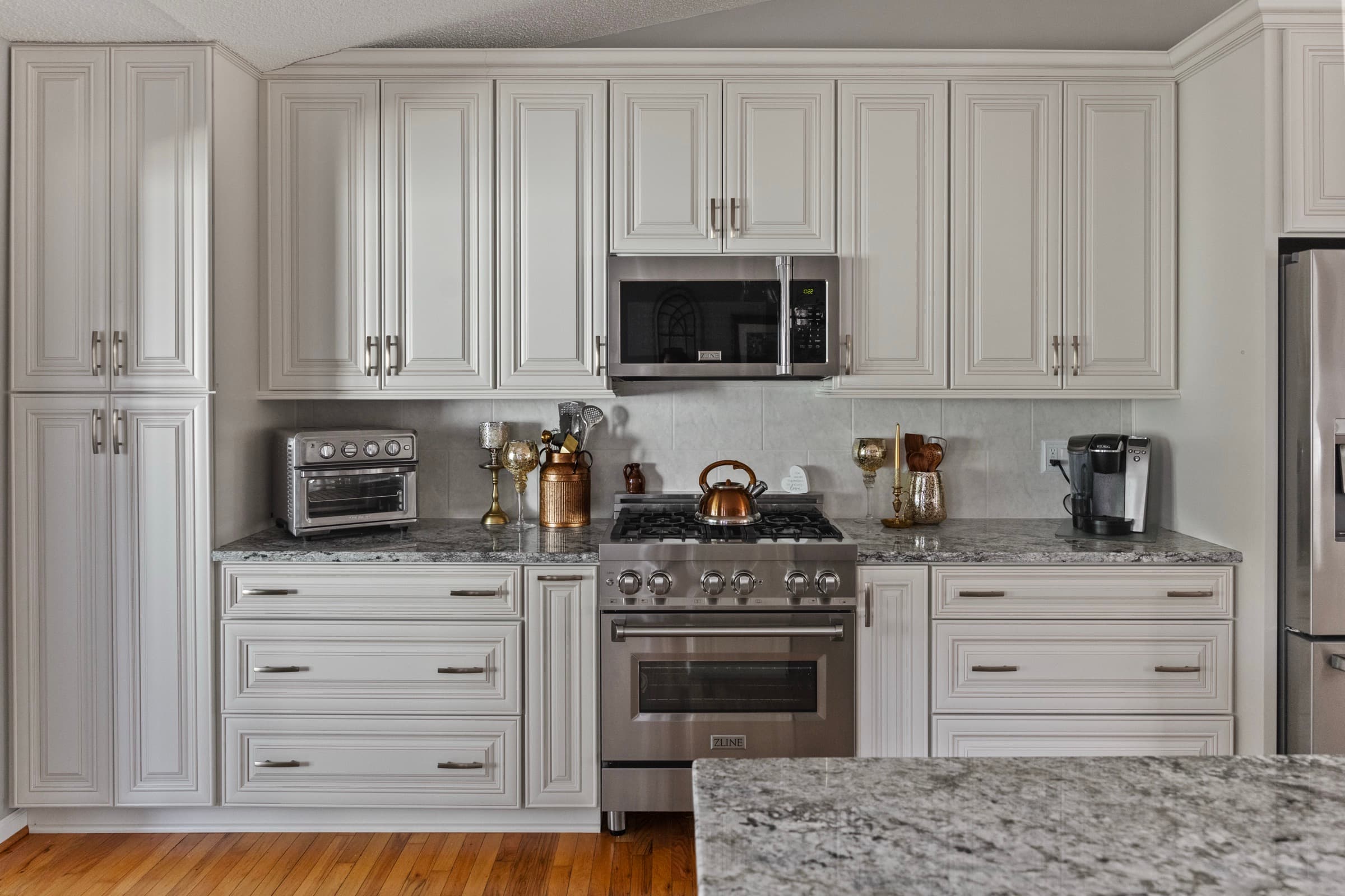 Galts Ferry kitchen remodel — cabinetry, range, and refrigerator wall