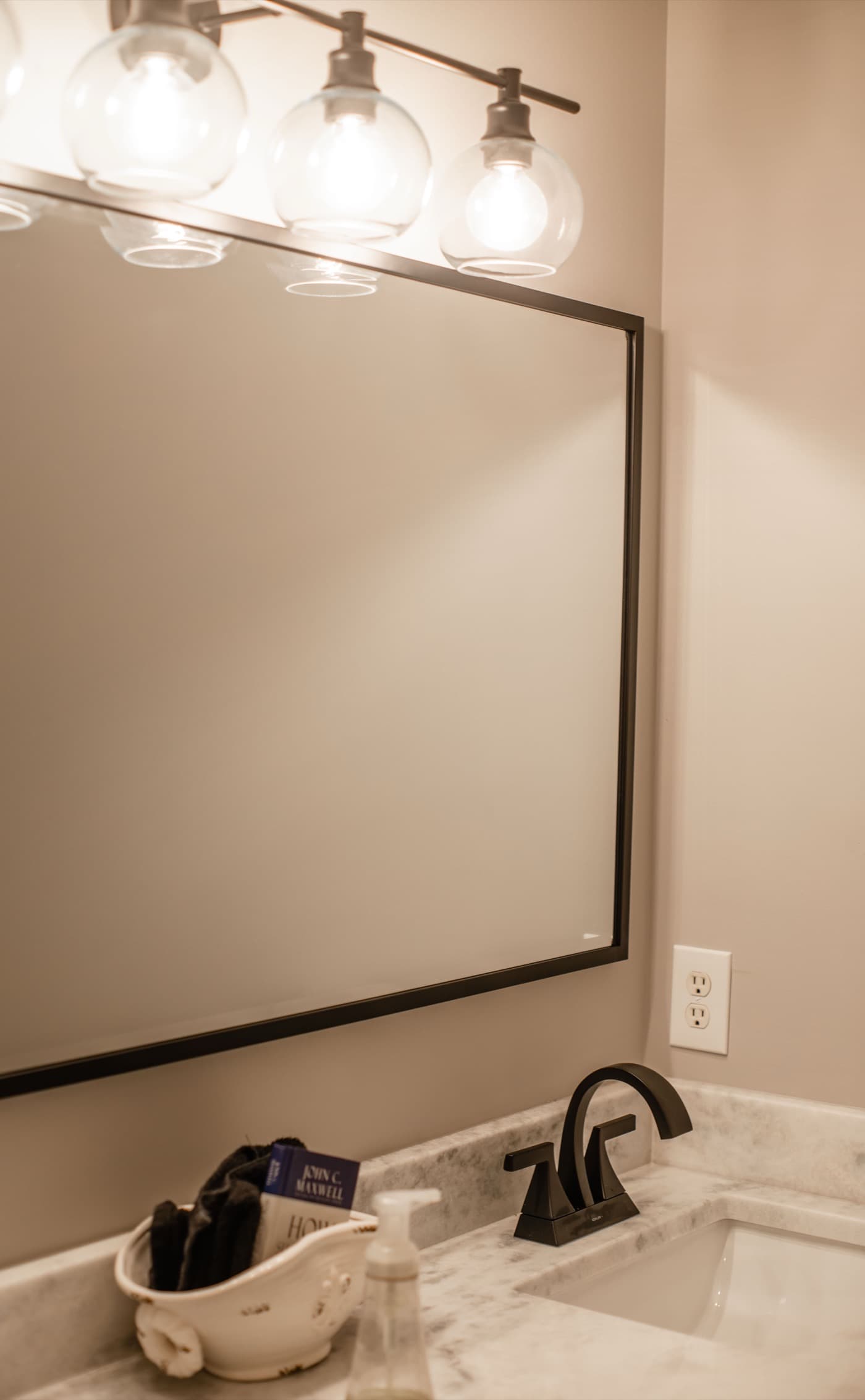 Guest bath vanity remodel — mirror and lighting