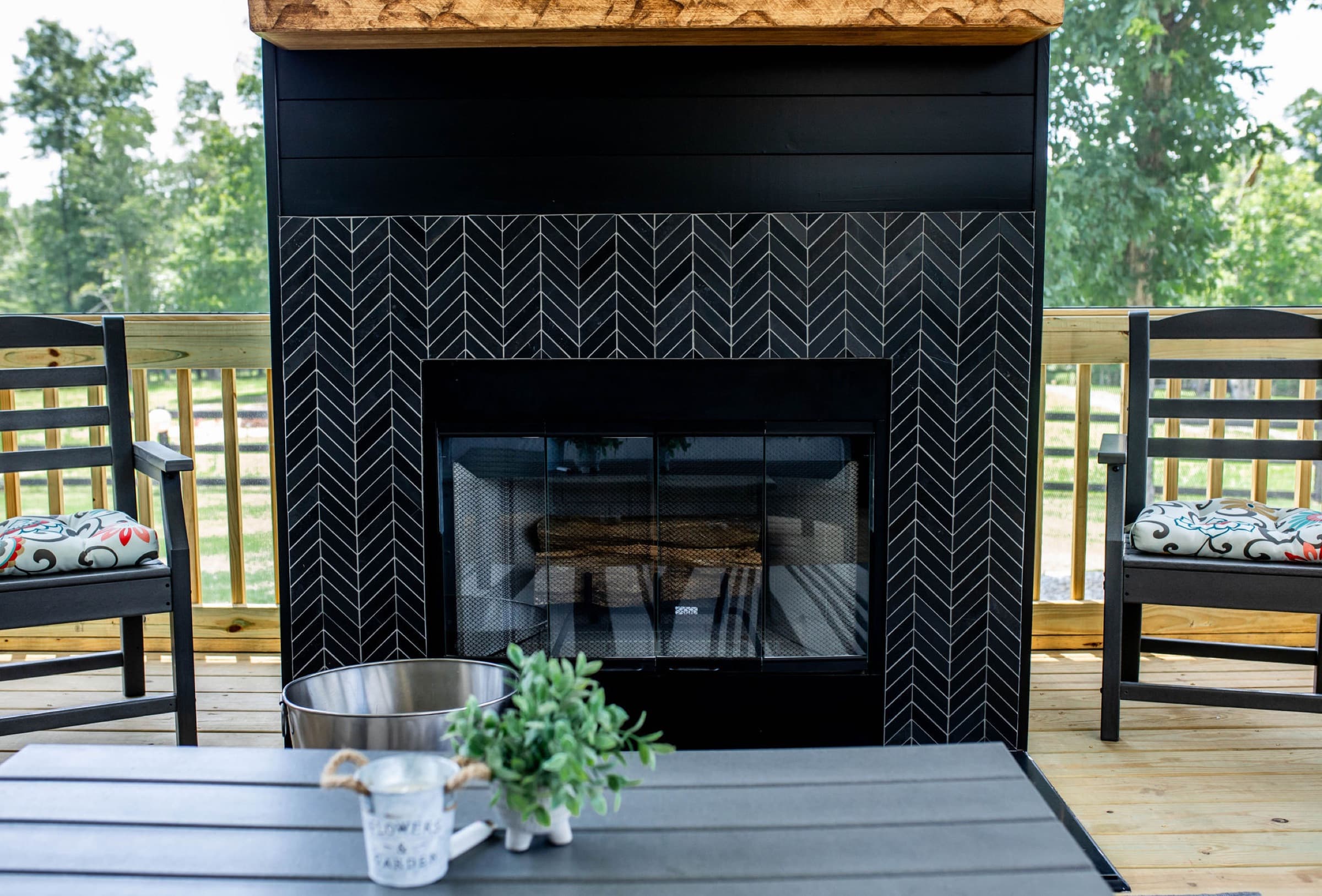 Mt. Carmel Church Ln screened porch — chevron tile fireplace surround detail
