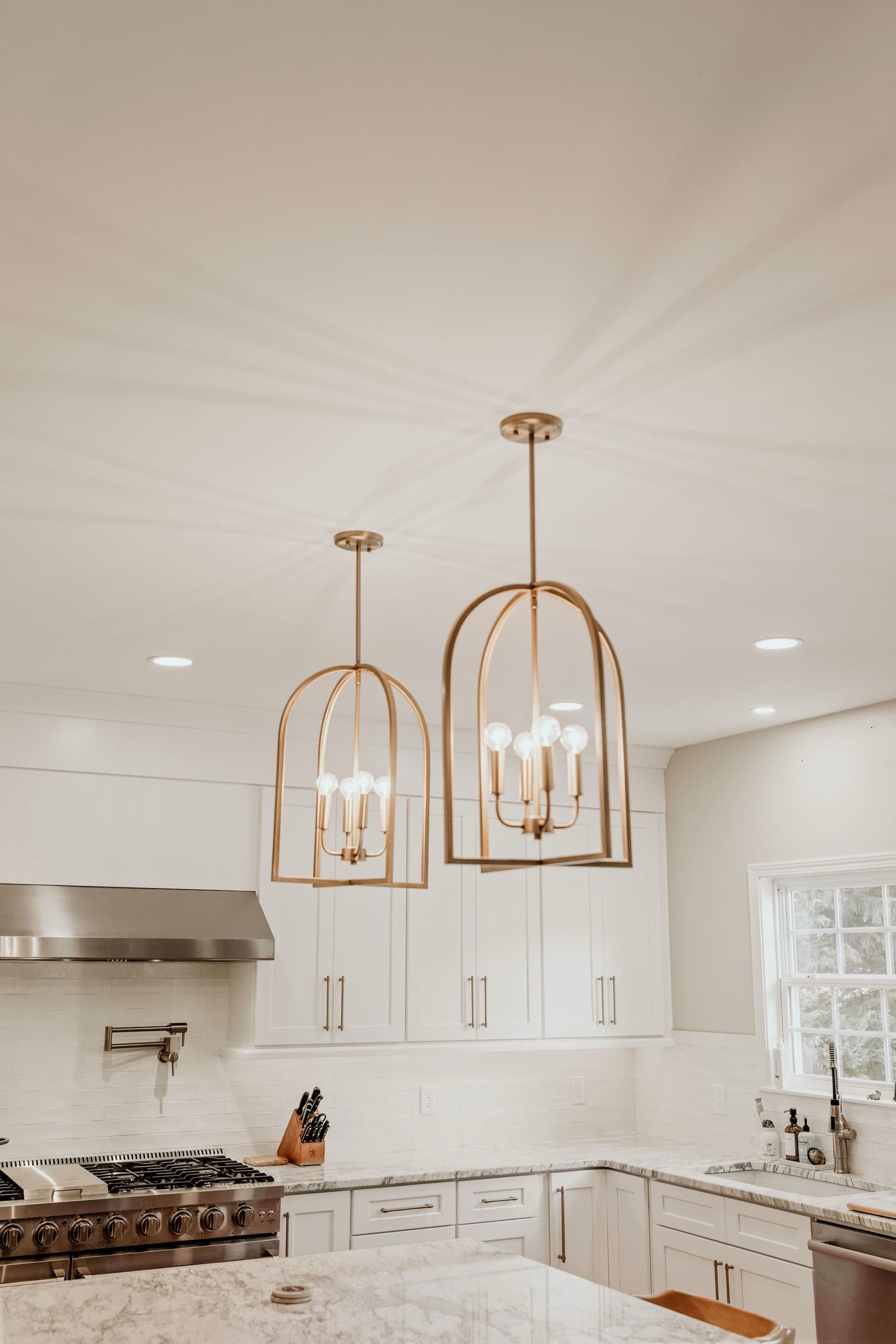 Powder Springs kitchen remodel — stainless range with pot-filler faucet